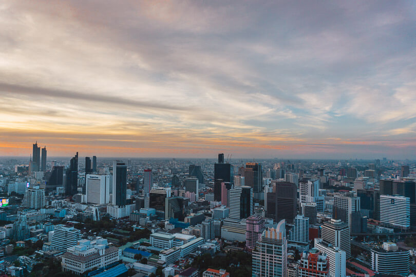Sunset over Bangkok's skyline from a roof top bar.