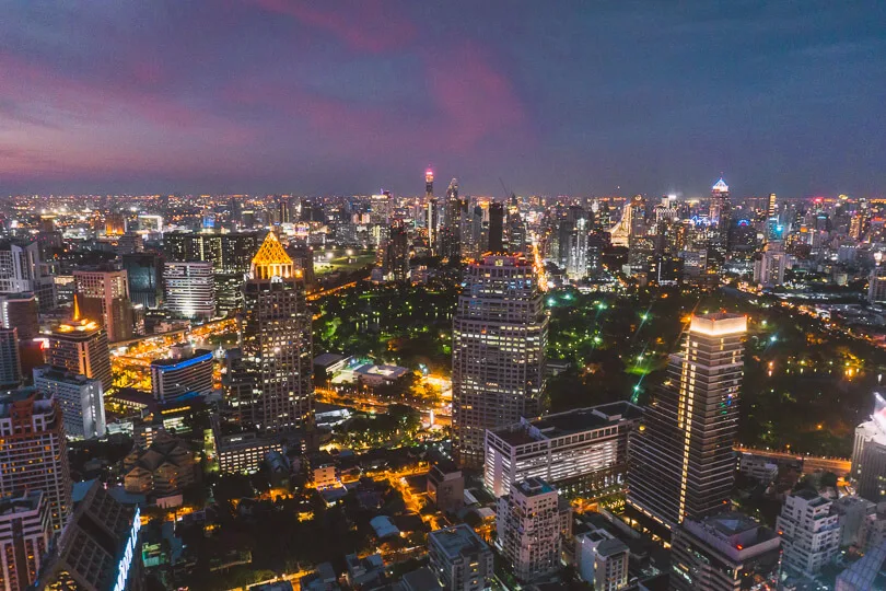 Looking out over Bangkok's skyline from Hi-SO Sofitel rooftop bar in Bangkok.